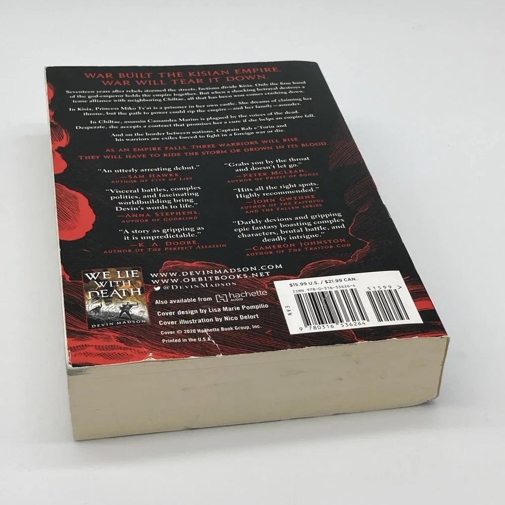 We Ride the Storm: The Reborn Empire #1 by Devin Madson paperback, Fantasy novel